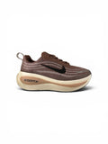 Nike Vomero Plus “Caldera Brown”
